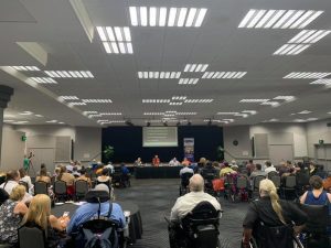 Audience and panel at the QDN Annual General Meeting