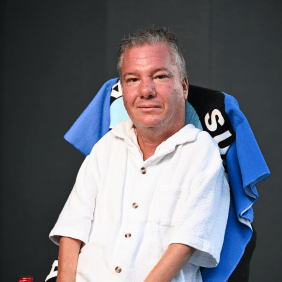 Man wearing a white button up shirt