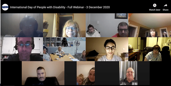 the faces of 15 people in a collage on a zoom call.