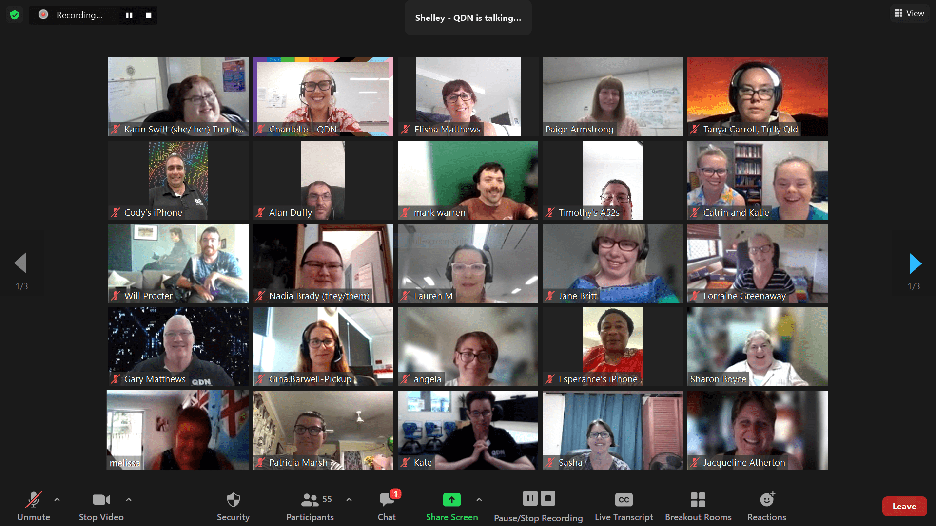 A screenshot of 25 men and women in different locations on a Zoom meeting. They are all looking at the screen smiling. 