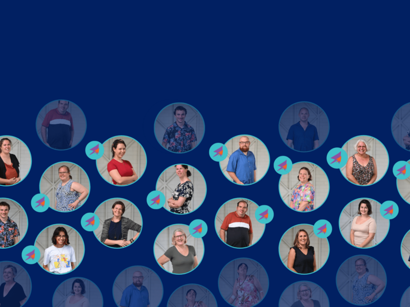A dark blue banner with circles across it with photos of all the emerging leaders inside, as well as some solid aqua circles.