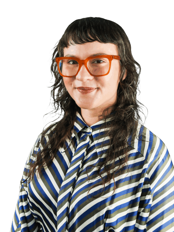 There is a headshot of a speaker and title descriptions that read “Autumn Skultorpe Crossroad Arts Artistic Director/ CEO”. Autumn is wearing a fun stripey button up shirt, orange square glasses. She has long brown hair with a fringe cut.